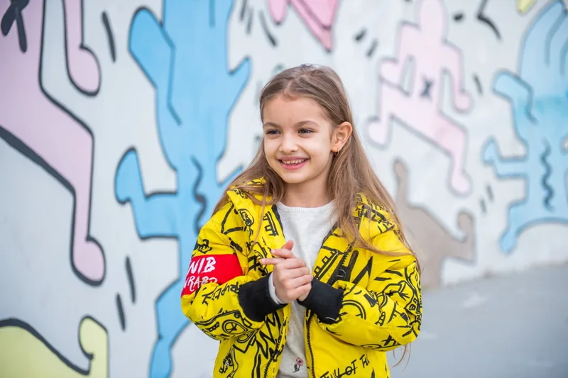 Photo against a graffiti backdrop in Baku